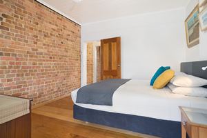 The main bedroom at 9 Alfred Street Terrace