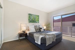 The Main Bedroom of a 2 Bedroom Townhouse Apartment at Birmingham Gardens Townhouses.