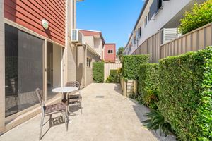 The Private Courtyard of a 2 Bedroom Townhouse Apartment at Birmingham Gardens Townhouses.
