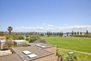 The Flagstaff apartment features a private balcony with 180 degree views over Foreshore Park.